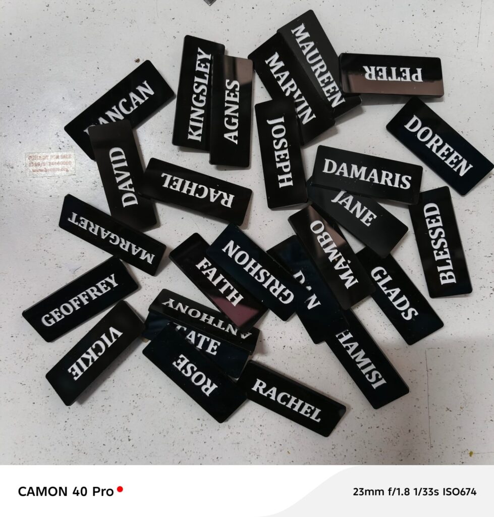 Staff perspex name badge with customizable name and title for professional identification in corporate, retail, and hospitality use in Kenya